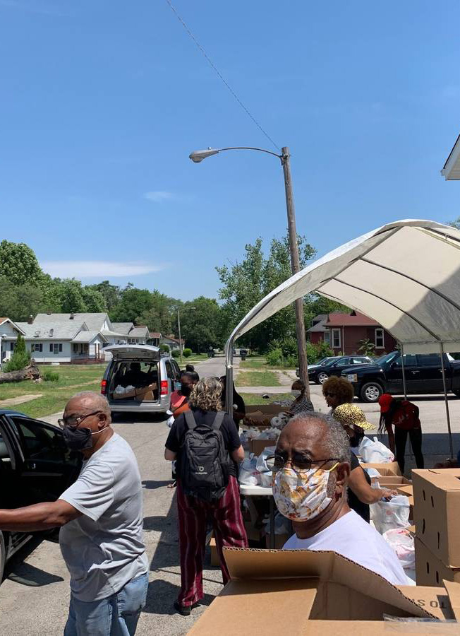 Workers at Neighborhood Food Drive