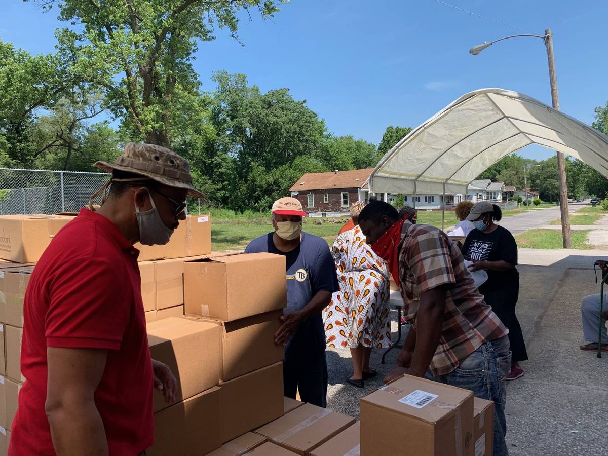 Workers at Neighborhood Food Drive