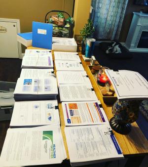 Best Practices for Suicide Prevention training materials being prepped. 