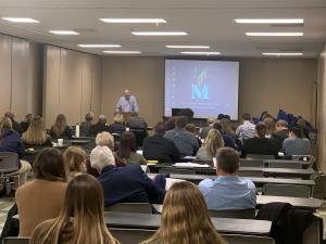Doctor Robert Farmer giving a brief overview of HEALTHIER TOGETHER 2025.