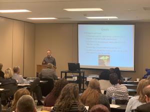 Doctor Gary Behrman of St. Louis University (SLU) presenting on Improving Physicians Knowledge & Skills in Suicide Prevention. 