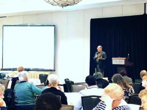Mark Peters, Executive Director of HEALTHIER TOGETHER, speaking at the 2019 Clergy Day. 