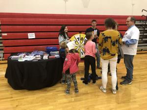 HEALTHIER TOGETHER's Executive Director, Mark Peters, helping our McKendree volunteers engage the attendees on health & wellness topics. 