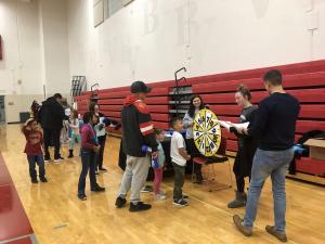 McKendree student volunteers educating families on various health & wellness topics.