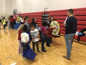 McKendree student volunteers educating families on various health & wellness topics.