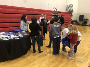 McKendree student volunteers educating families on various health & wellness topics.